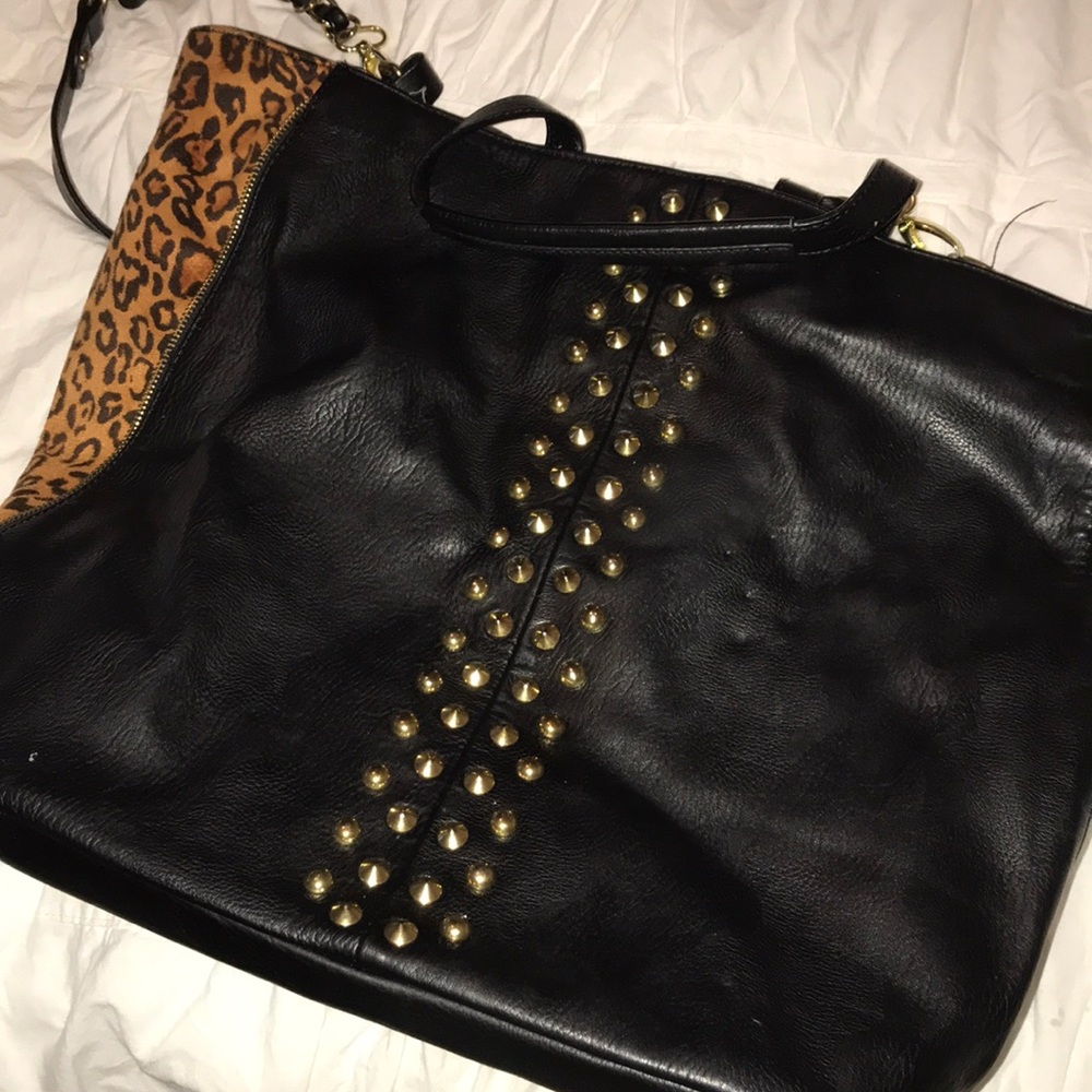 Black purse with cheetah accents